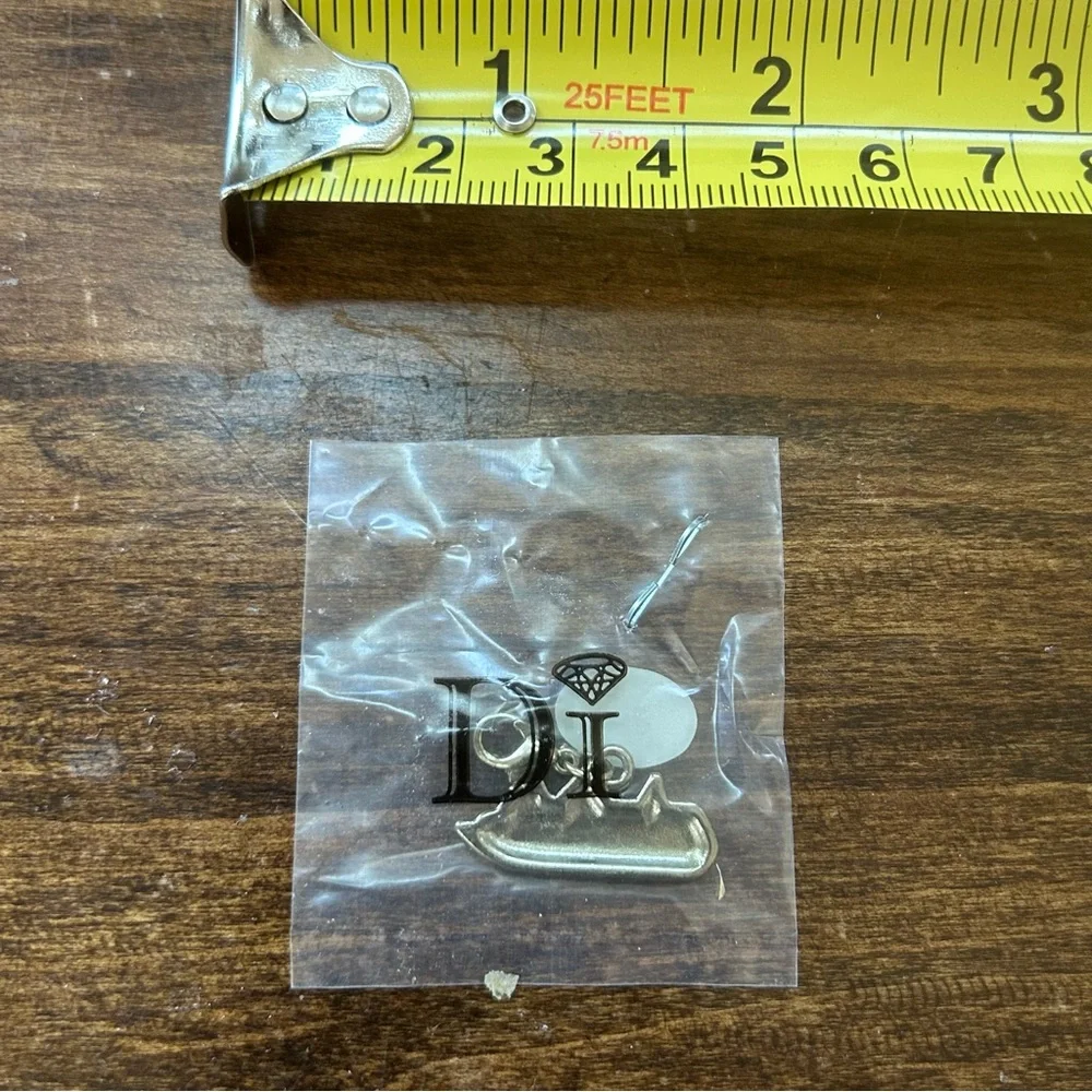 4/$15 One Diamonds International boat charm #2
